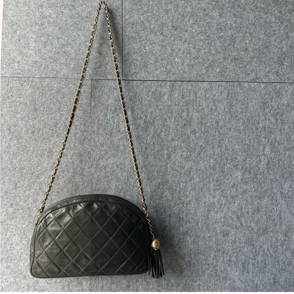 Vintage Chanel Crossbody Camera Tassel Bag
Black Lambskin Authentic